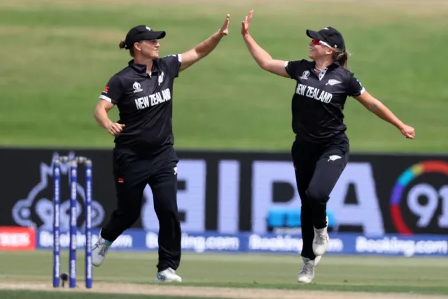 Sophie Devine and Jess Kerr celebrate with the wicket of Kycia Knight