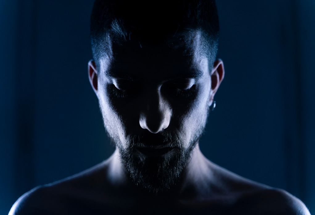 male portrait with dramatic lighting.