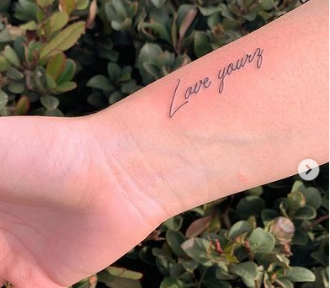 love wording Wrist Tattoo