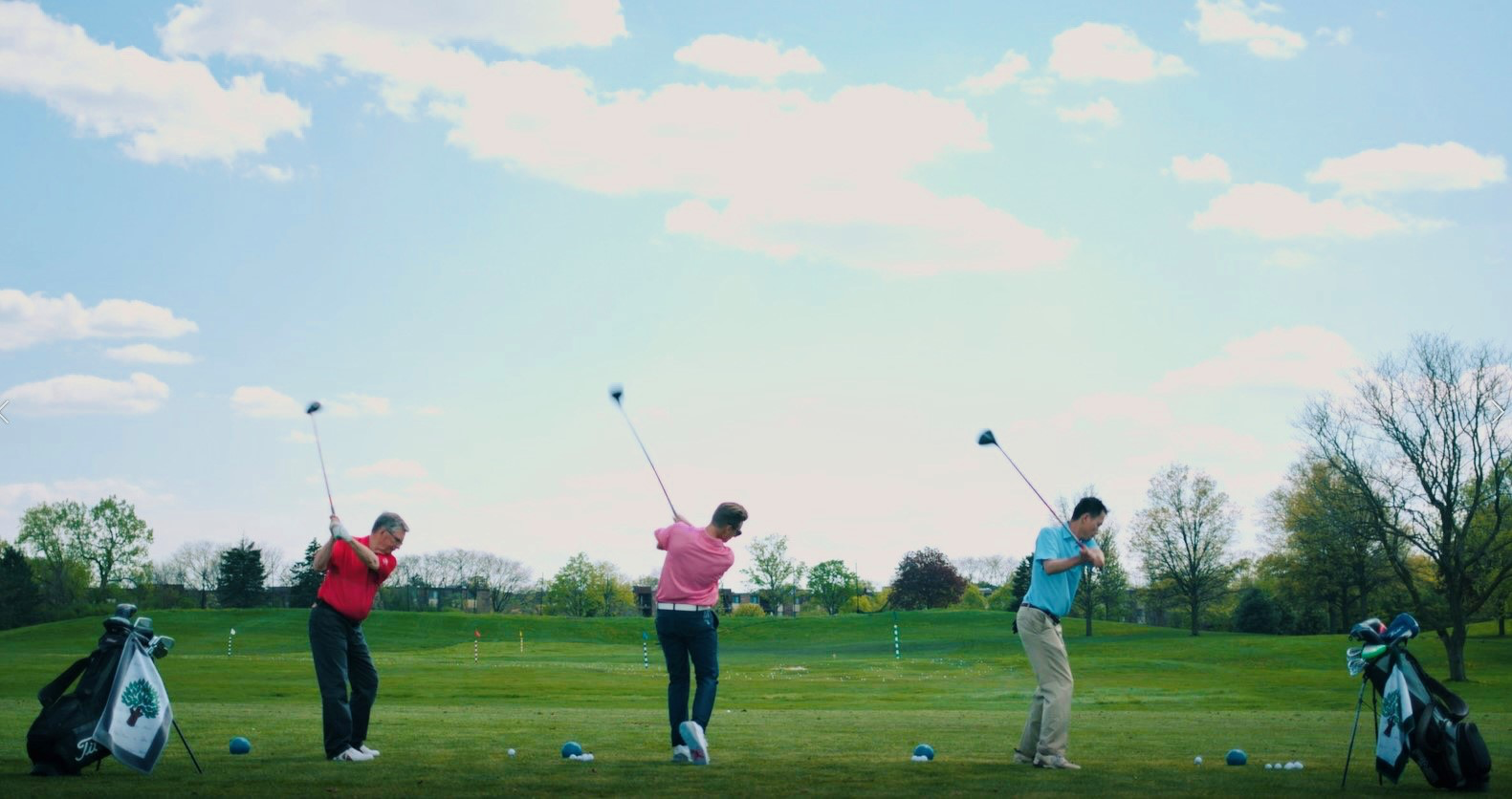 golfer hitting balls at driving range