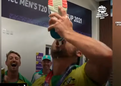 Australia won T20 world cup, celebrating by Drinking shampain by shoes.